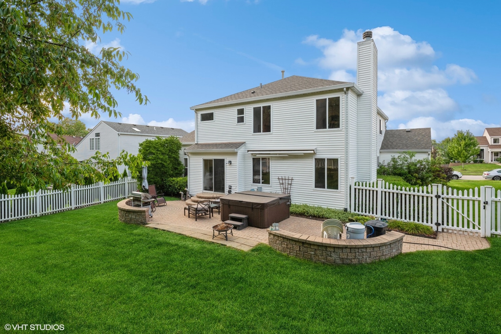 14505 Etchingham Drive Lockport, IL 60441 - Photo 17 of 19 a view of a patio with a table and chairs