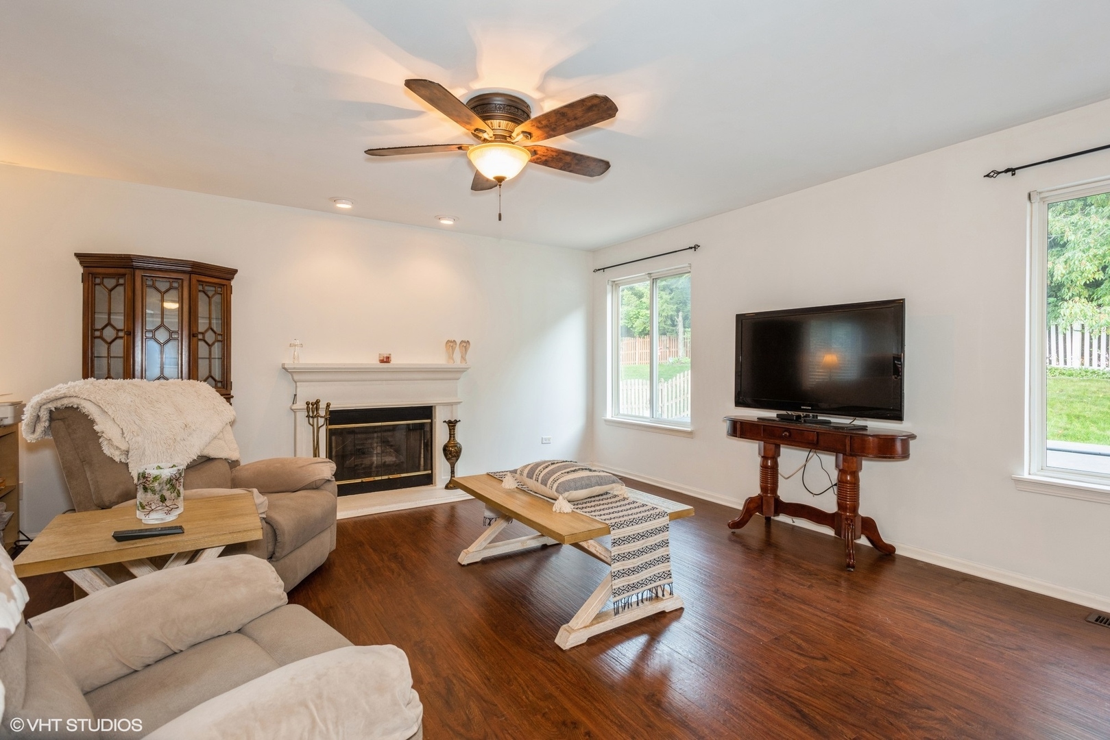 14505 Etchingham Drive Lockport, IL 60441 - Photo 4 of 19 a living room with furniture a flat screen tv and a fireplace