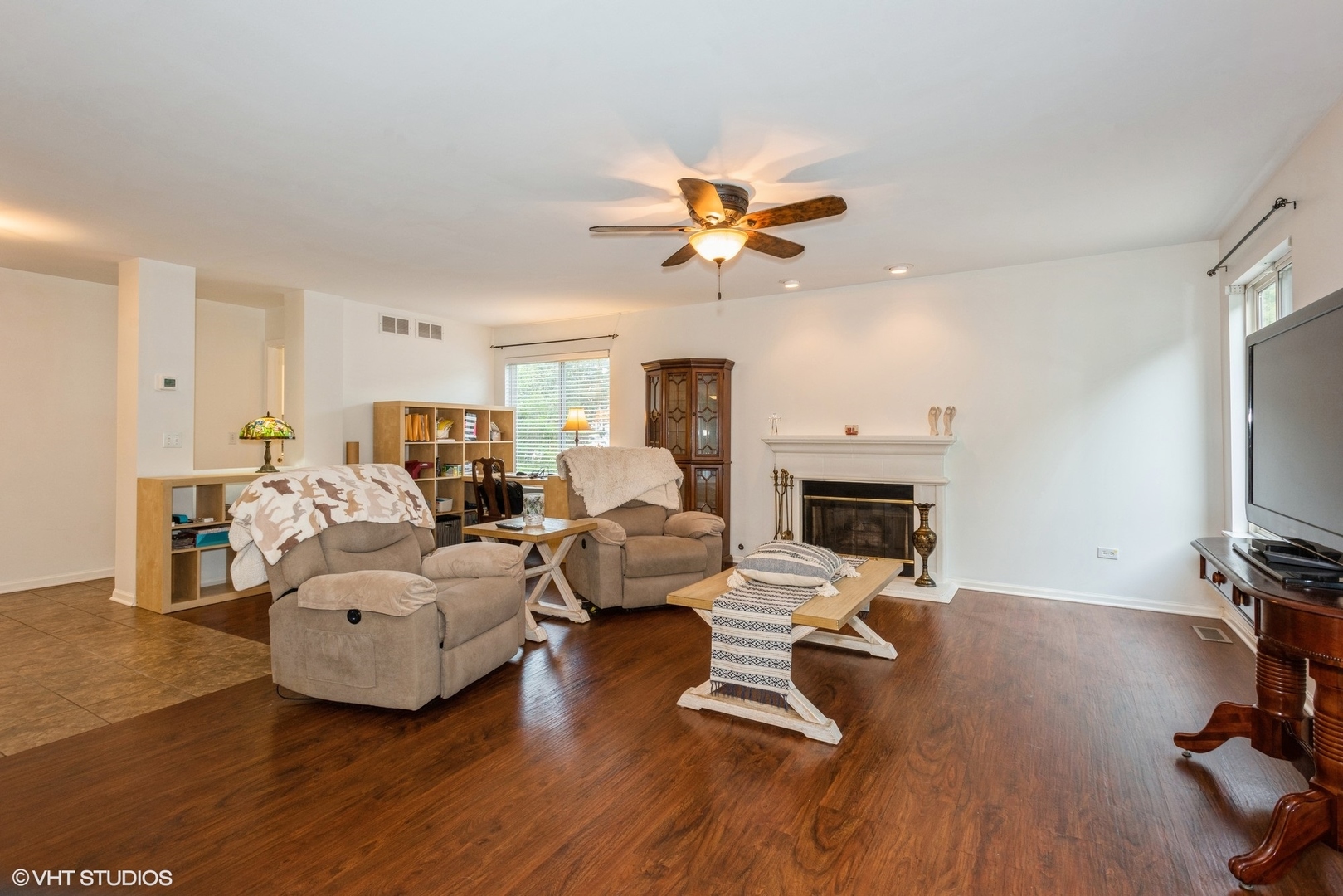 14505 Etchingham Drive Lockport, IL 60441 - Photo 5 of 19 a living room with furniture a fireplace and a flat screen tv
