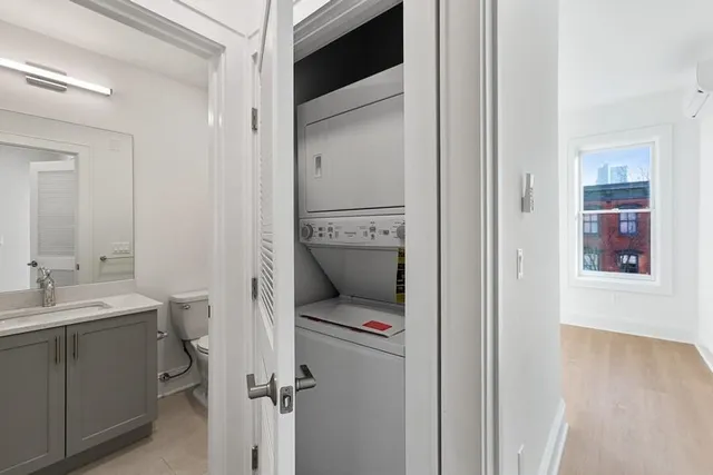 a en suite bathroom with a toilet sink and tub