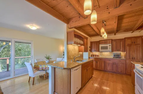 a bedroom with a bed and a fireplace