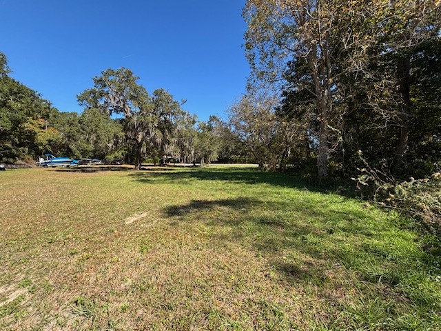 0 Lents Road Yulee, FL 32097 - Photo 8 of 8 a view of outdoor space with deck and yard