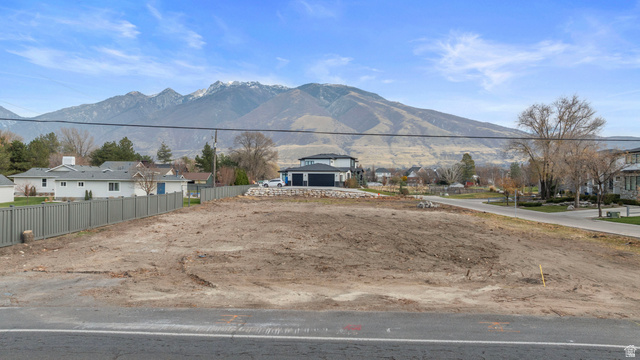 View of mountain backdrop with nearby suburban area