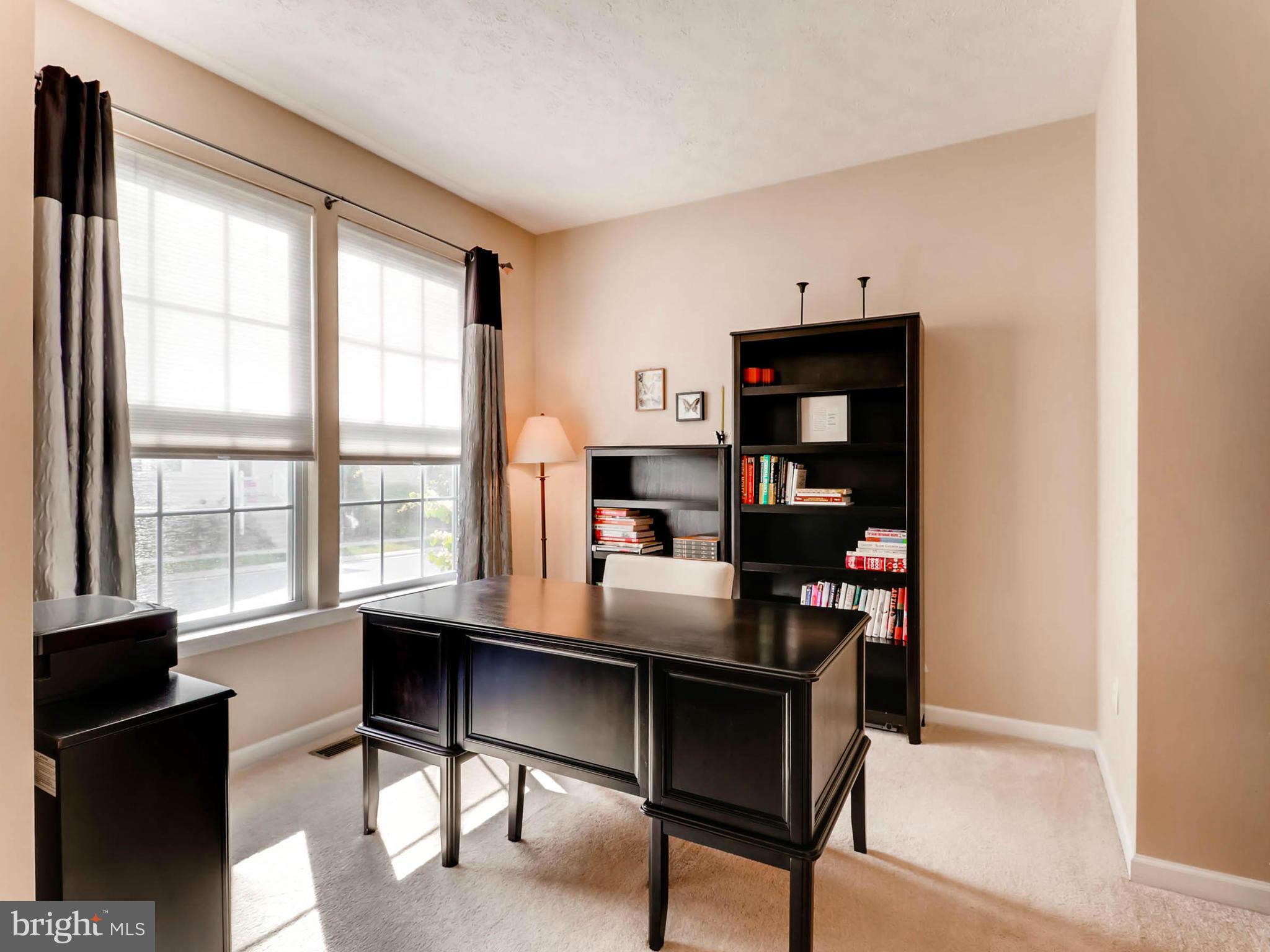 709 MacDill Road Baltimore, MD 21220 - Photo 8 of 30 a workspace with furniture and window