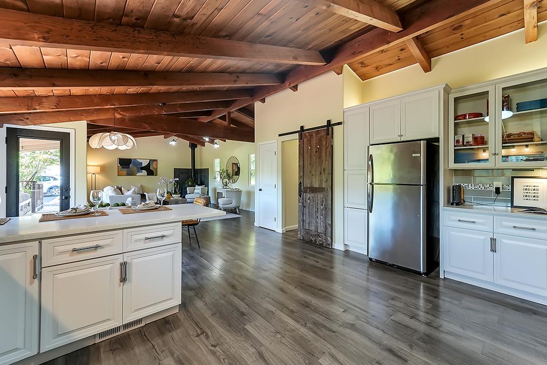14136 Long Ridge Road Los Gatos, CA 95033 - Photo 12 of 75 a kitchen with stainless steel appliances a refrigerator and a stove top oven