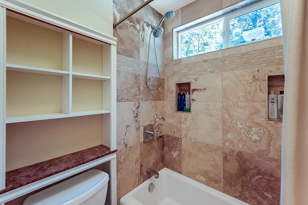 14136 Long Ridge Road Los Gatos, CA 95033 - Photo 22 of 75 a bathroom with a shower and a sink