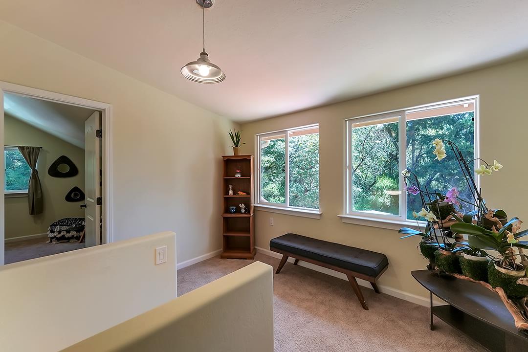 14136 Long Ridge Road Los Gatos, CA 95033 - Photo 24 of 75 a living room with furniture and a window