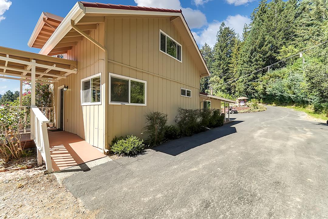 14136 Long Ridge Road Los Gatos, CA 95033 - Photo 39 of 75 a view of a house with backyard and trees
