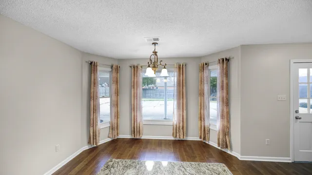 a view of livingroom with hardwood floor and window