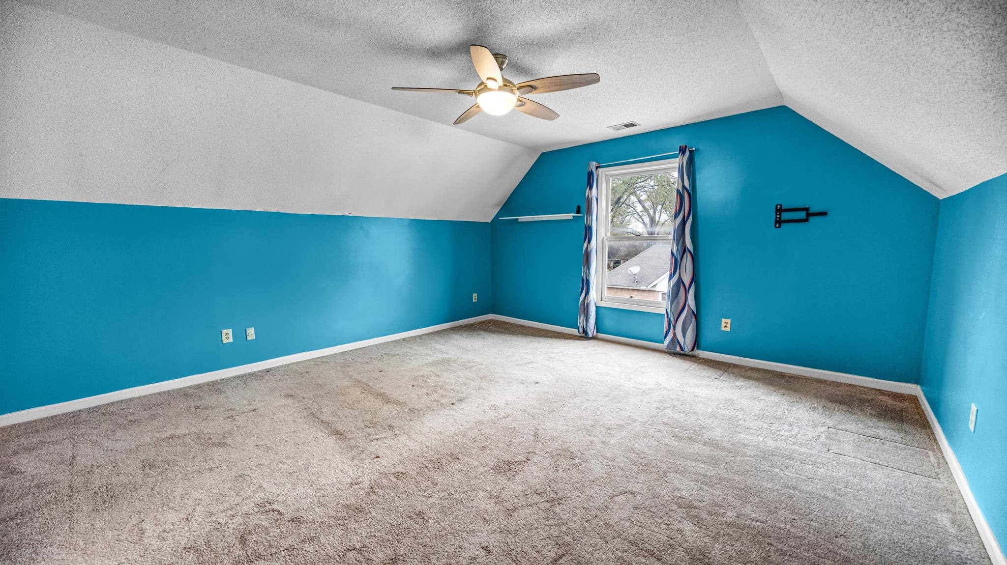 1105 Winrose Drive Collierville, TN 38017 - Photo 21 of 37 an empty room with fan and windows