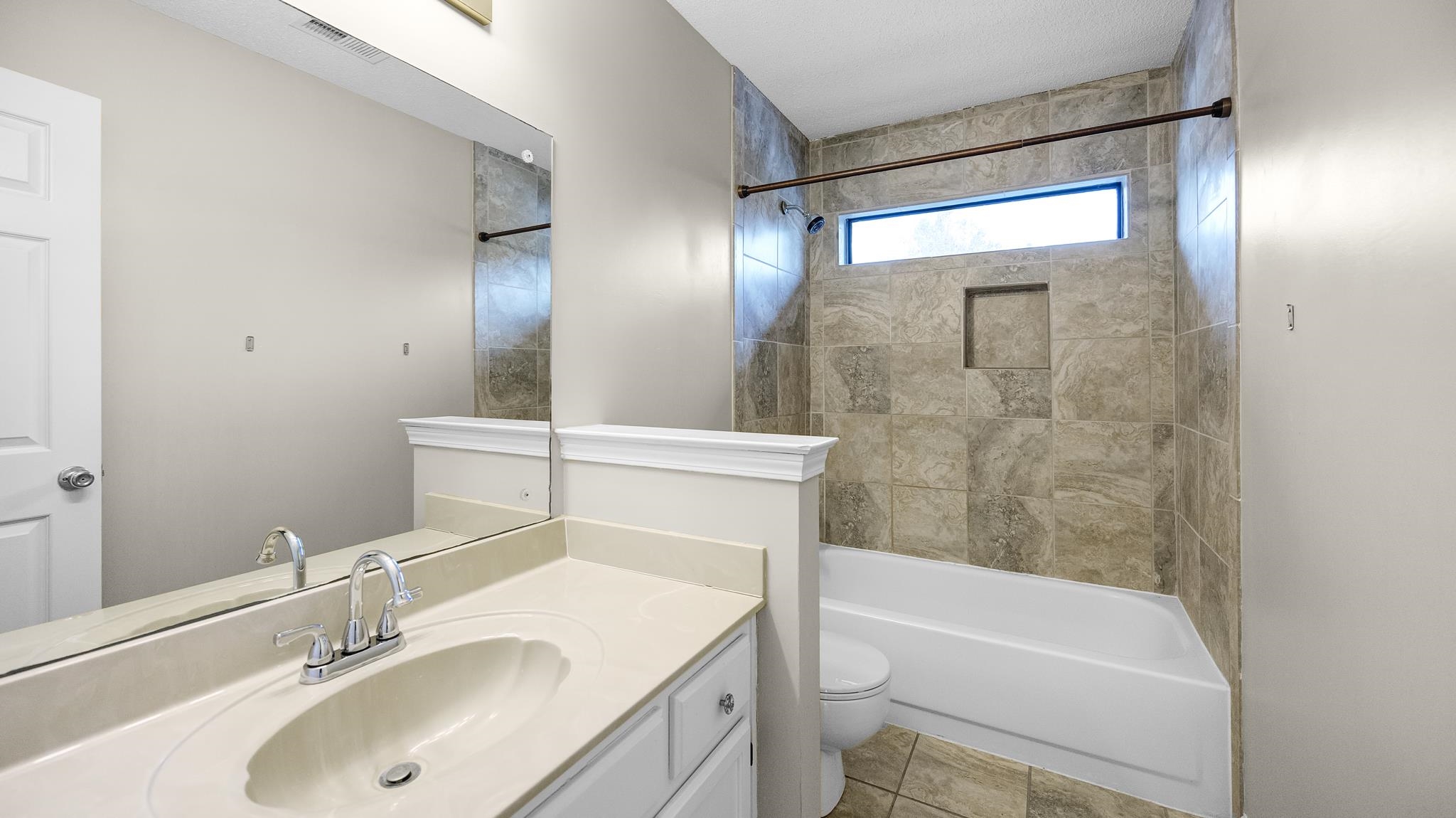 1105 Winrose Drive Collierville, TN 38017 - Photo 25 of 37 a bathroom with a sink toilet and shower