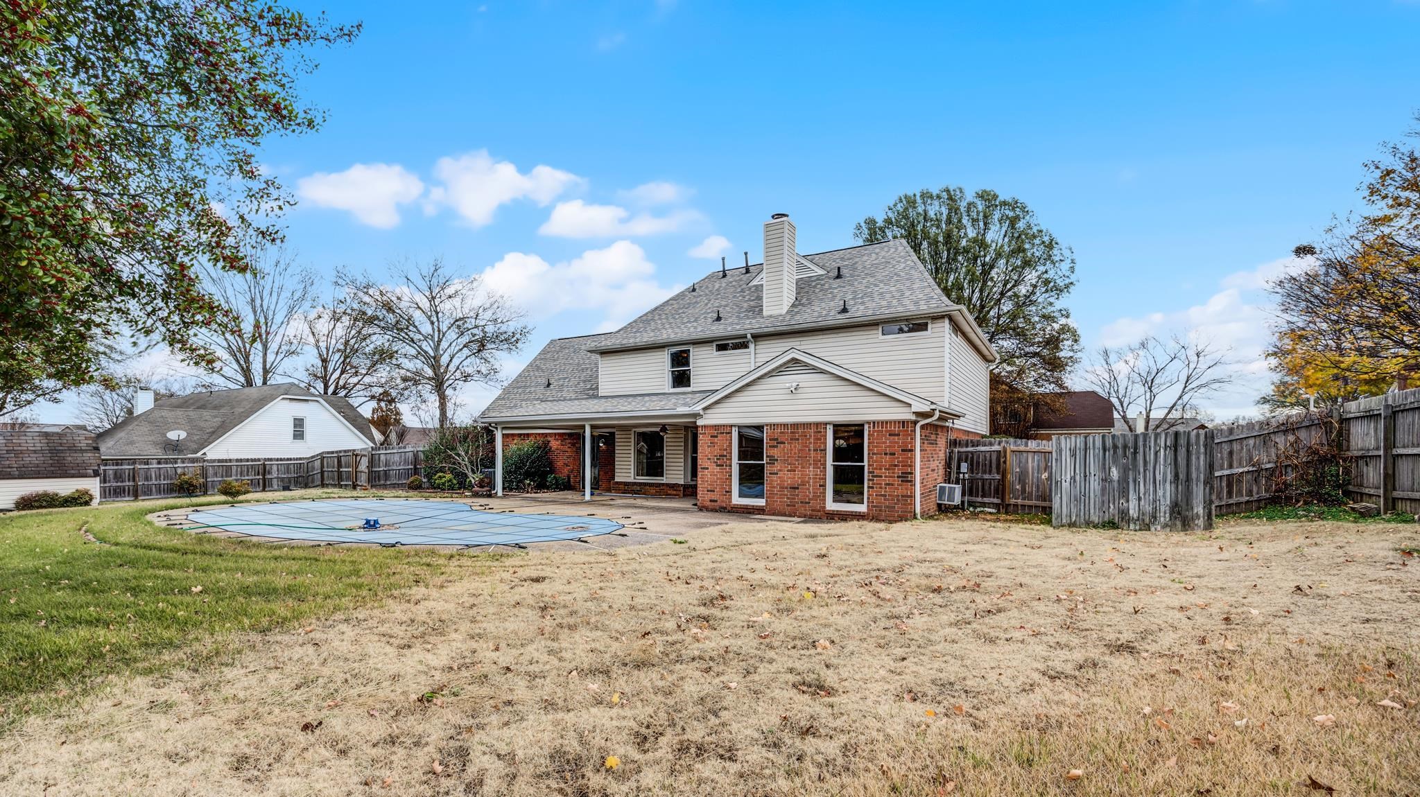 1105 Winrose Drive Collierville, TN 38017 - Photo 35 of 37 a view of a yard with a house and a large tree