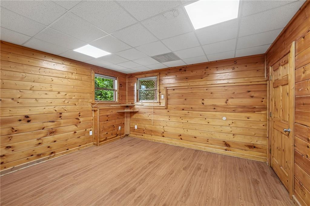 1384 Crystal Lane Northeast Ranger, GA 30734 - Photo 50 of 89 a view of empty room with wooden floor and fan