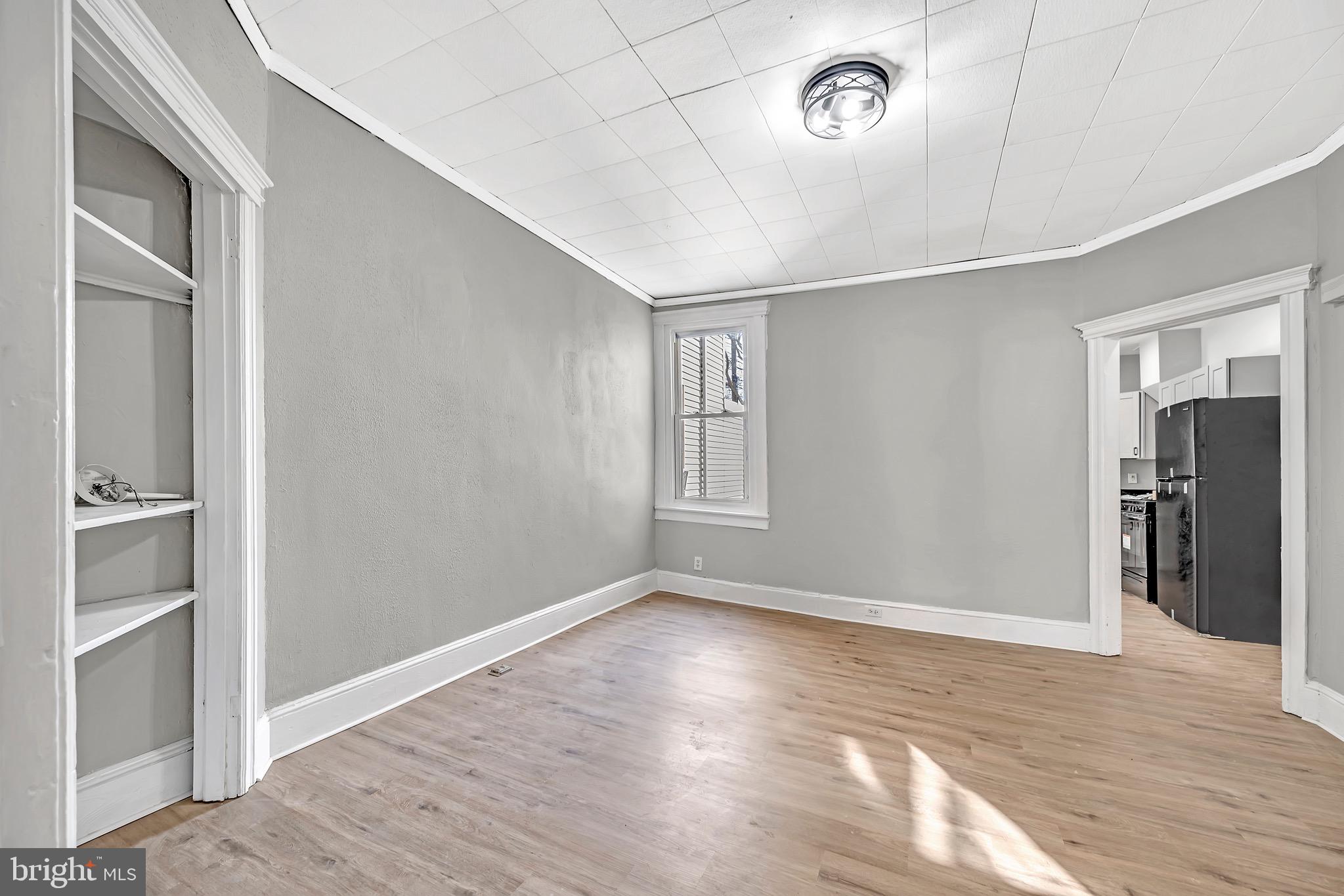 25 Adella Avenue Hamilton, NJ 08609 - Photo 6 of 15 a view of an empty room with closet and a window