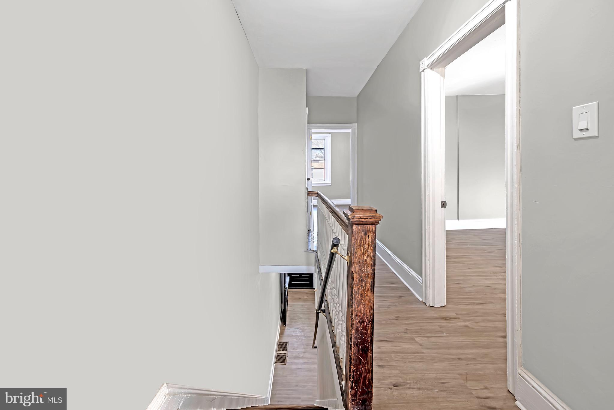 25 Adella Avenue Hamilton, NJ 08609 - Photo 10 of 15 a view of a livingroom with stairs