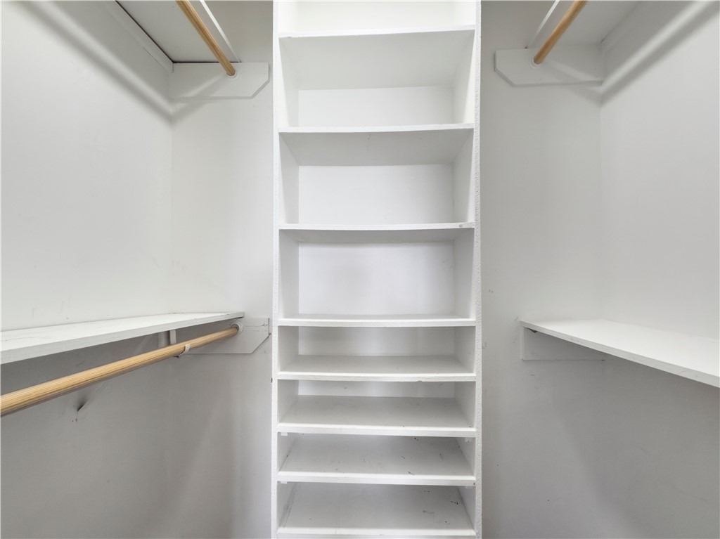 3003 Highwood Lane Bryan, TX 77803 - Photo 15 of 21 a view of walk in closet with empty racks