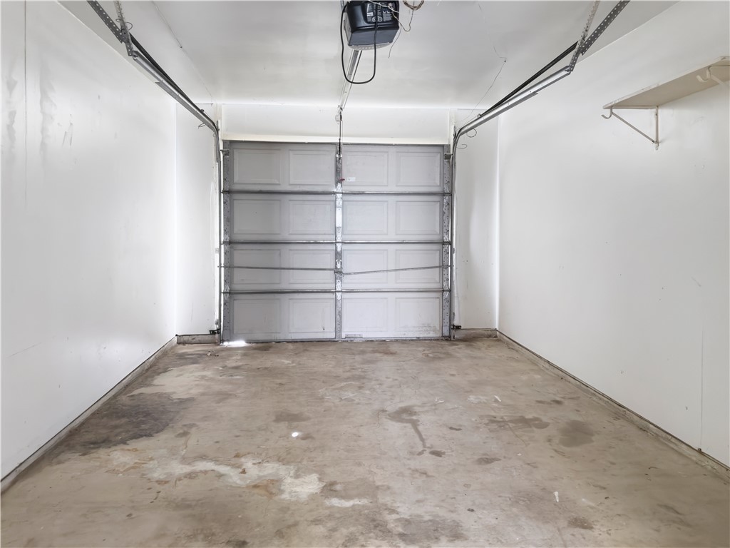 3003 Highwood Lane Bryan, TX 77803 - Photo 9 of 21 a view of an empty room with empty racks