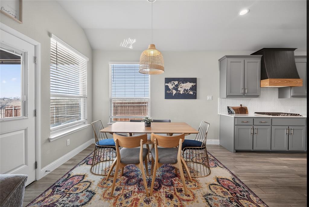 2252 Knightsgate Road Argyle, TX 76226 - Photo 13 of 36 Dining area featuring baseboards and light wood-style floors