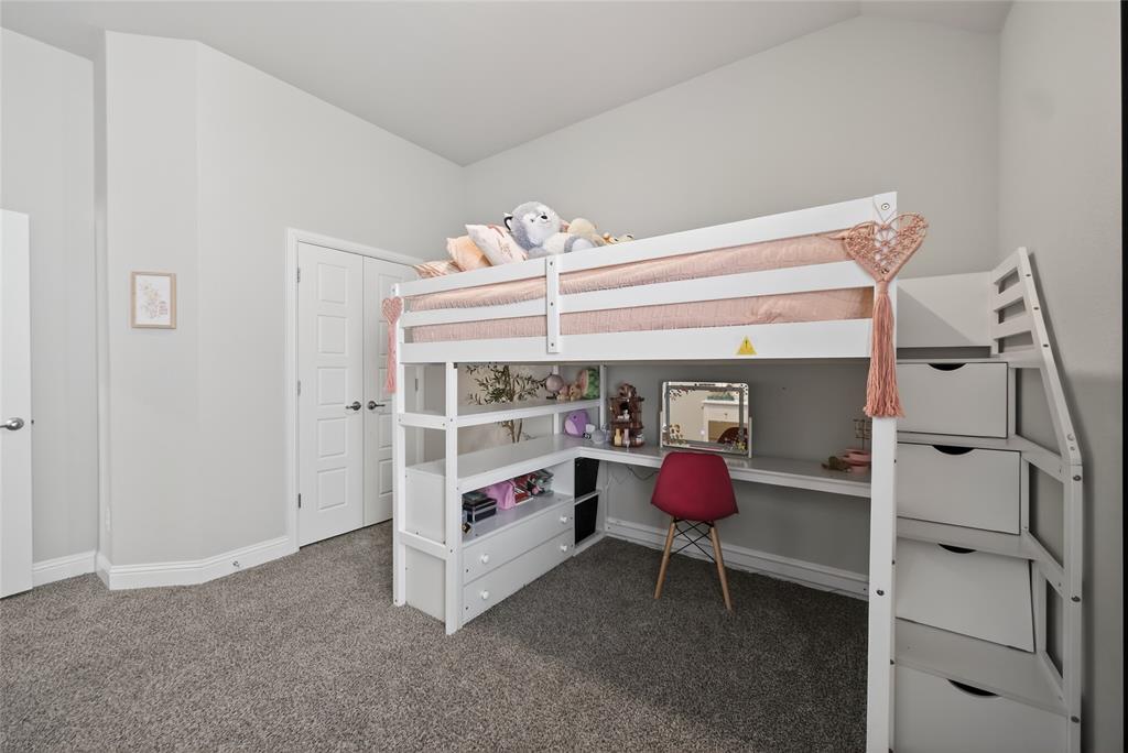 2252 Knightsgate Road Argyle, TX 76226 - Photo 21 of 36 Bedroom featuring built in study area and dark carpet