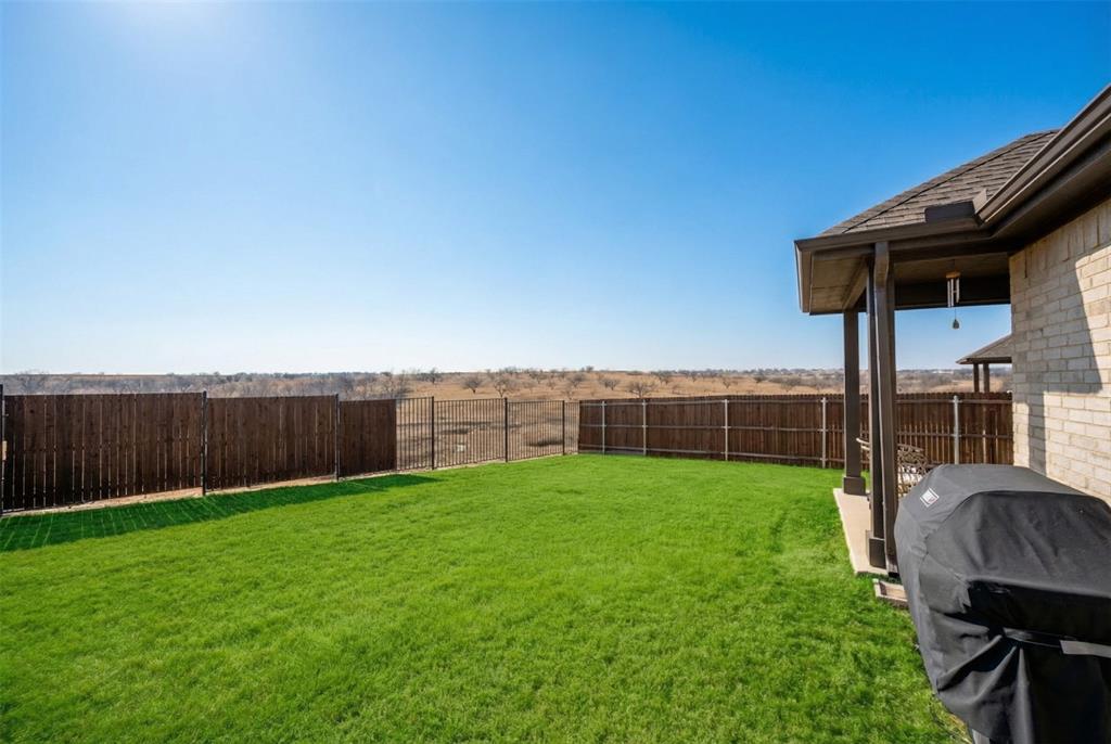 2252 Knightsgate Road Argyle, TX 76226 - Photo 31 of 36 Fenced backyard featuring a patio area