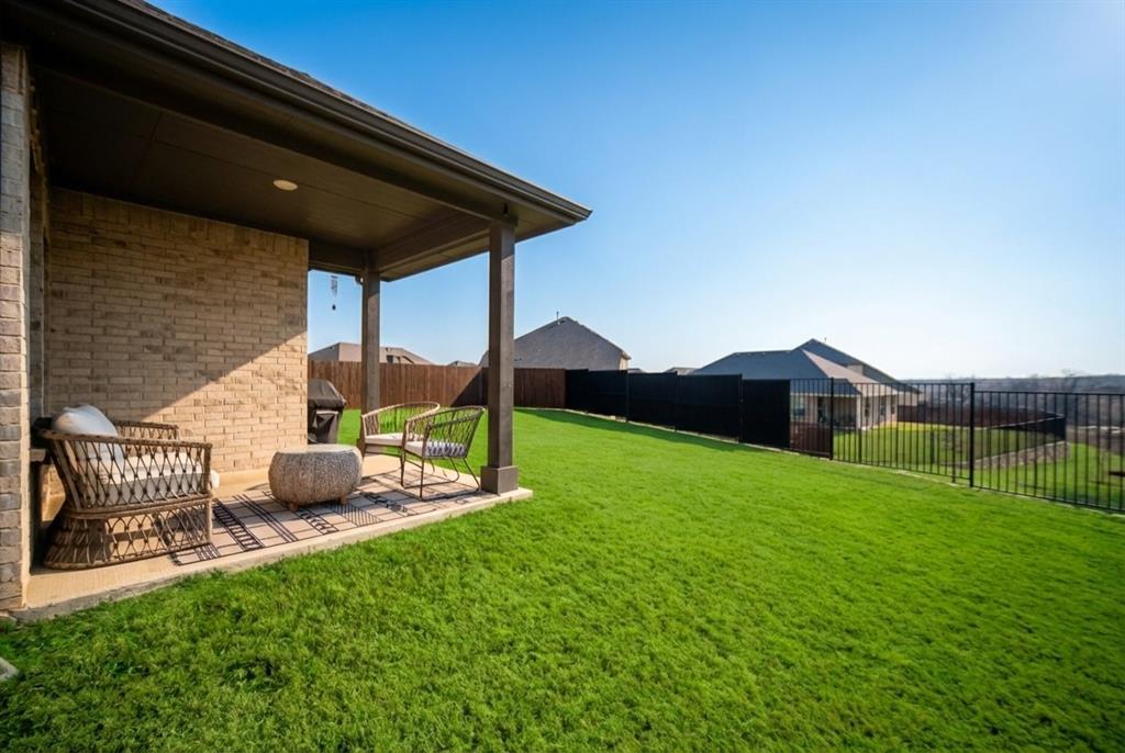 2252 Knightsgate Road Argyle, TX 76226 - Photo 33 of 36 Fenced backyard featuring a patio area