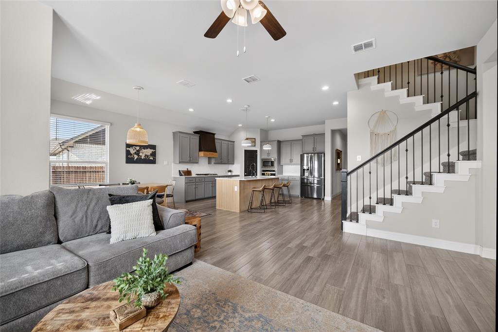 2252 Knightsgate Road Argyle, TX 76226 - Photo 7 of 36 Living area with ceiling fan, dark wood-style floors, and recessed lighting