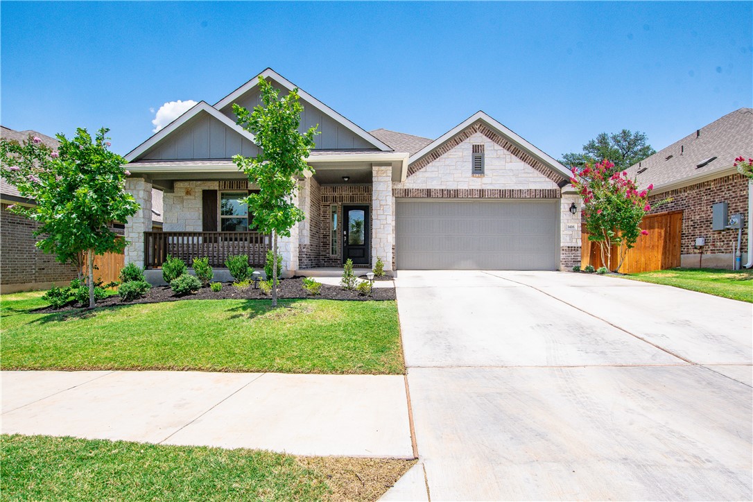 1416 Morning View Road Georgetown, TX 78628 - Photo 1 of 1 a front view of house with yard and green space