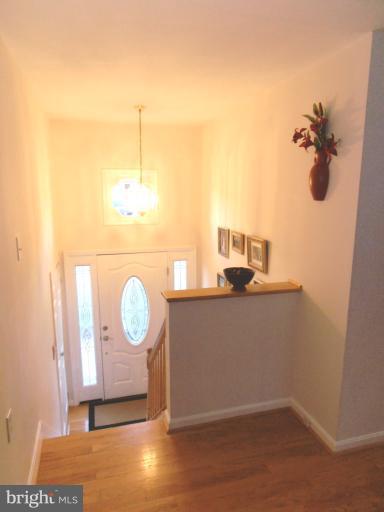132 Embleton Road Owings Mills, MD 21117 - Photo 17 of 30 Open foyer, hardwood flooring.