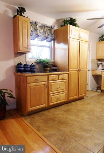 132 Embleton Road Owings Mills, MD 21117 - Photo 3 of 30 Hardwood from Dining Rm to quality tile.