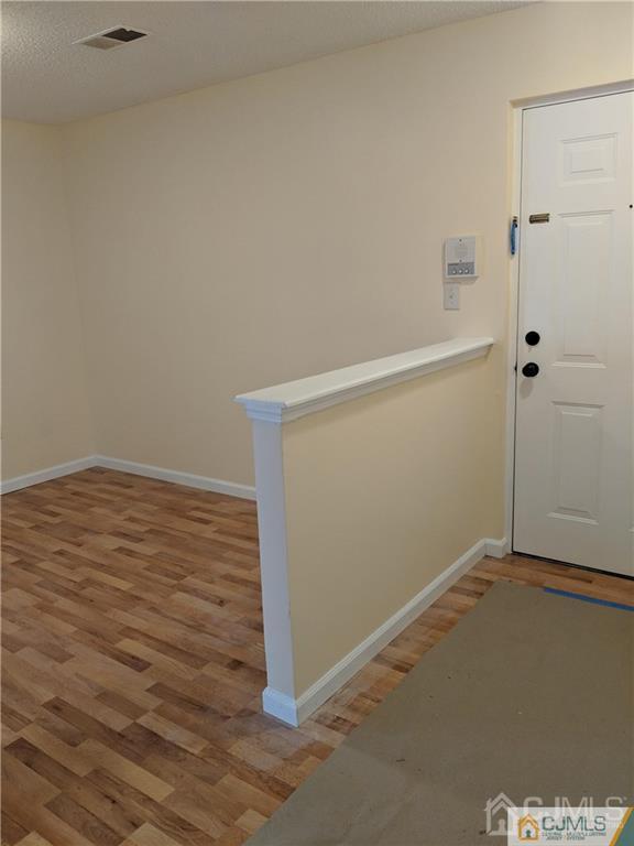 1223 Edpas Road, Unit 1223 New Brunswick, NJ 08901 - Photo 14 of 18 an empty room with an empty space