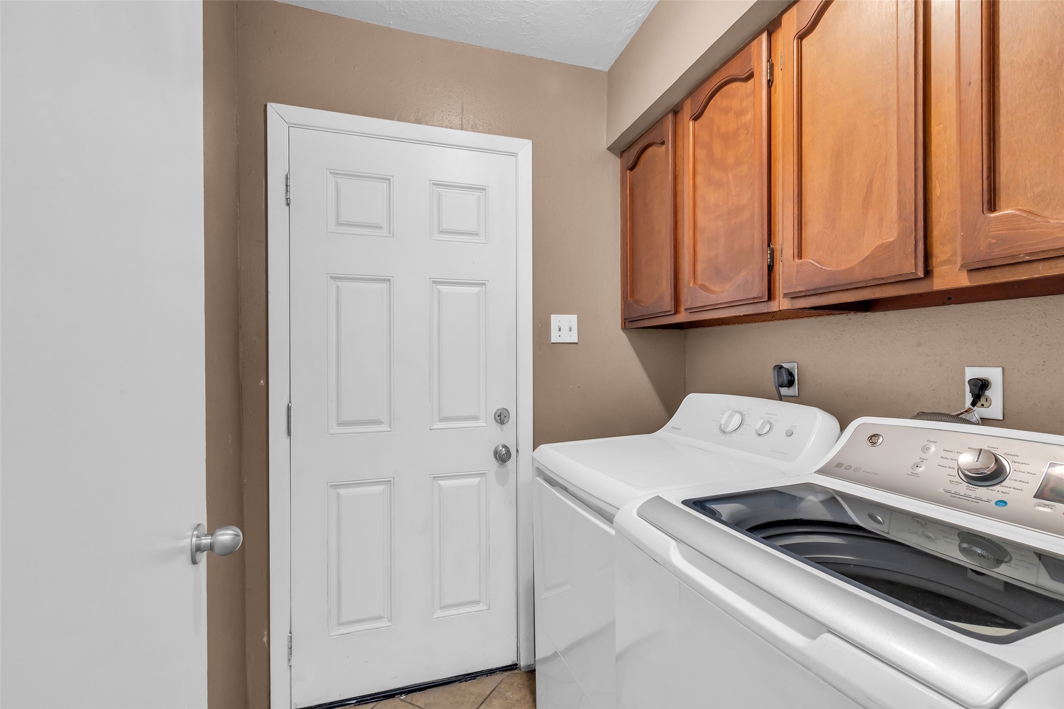 3435 Acorn Springs Lane Spring, TX 77389 - Photo 13 of 23 a utility room with dryer and washer