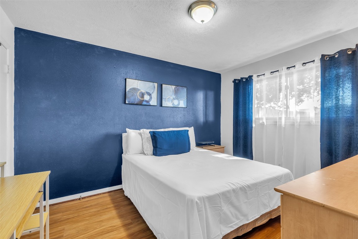 3435 Acorn Springs Lane Spring, TX 77389 - Photo 18 of 23 a bed room with a bed and a table