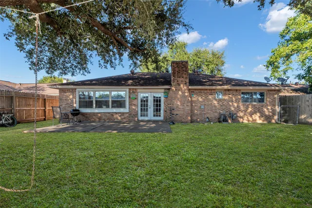 front view of a house with a garden
