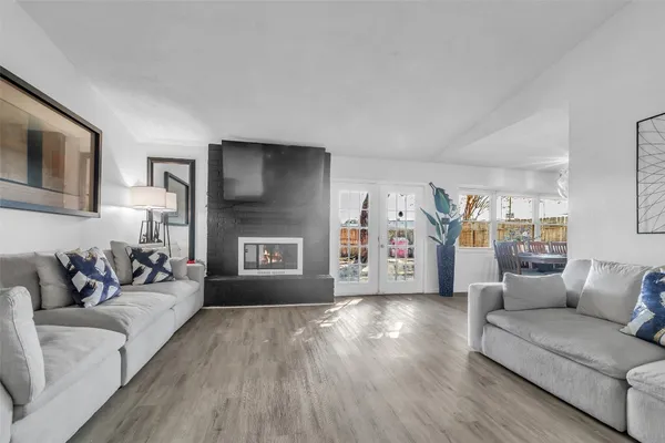 a living room with furniture and a couch