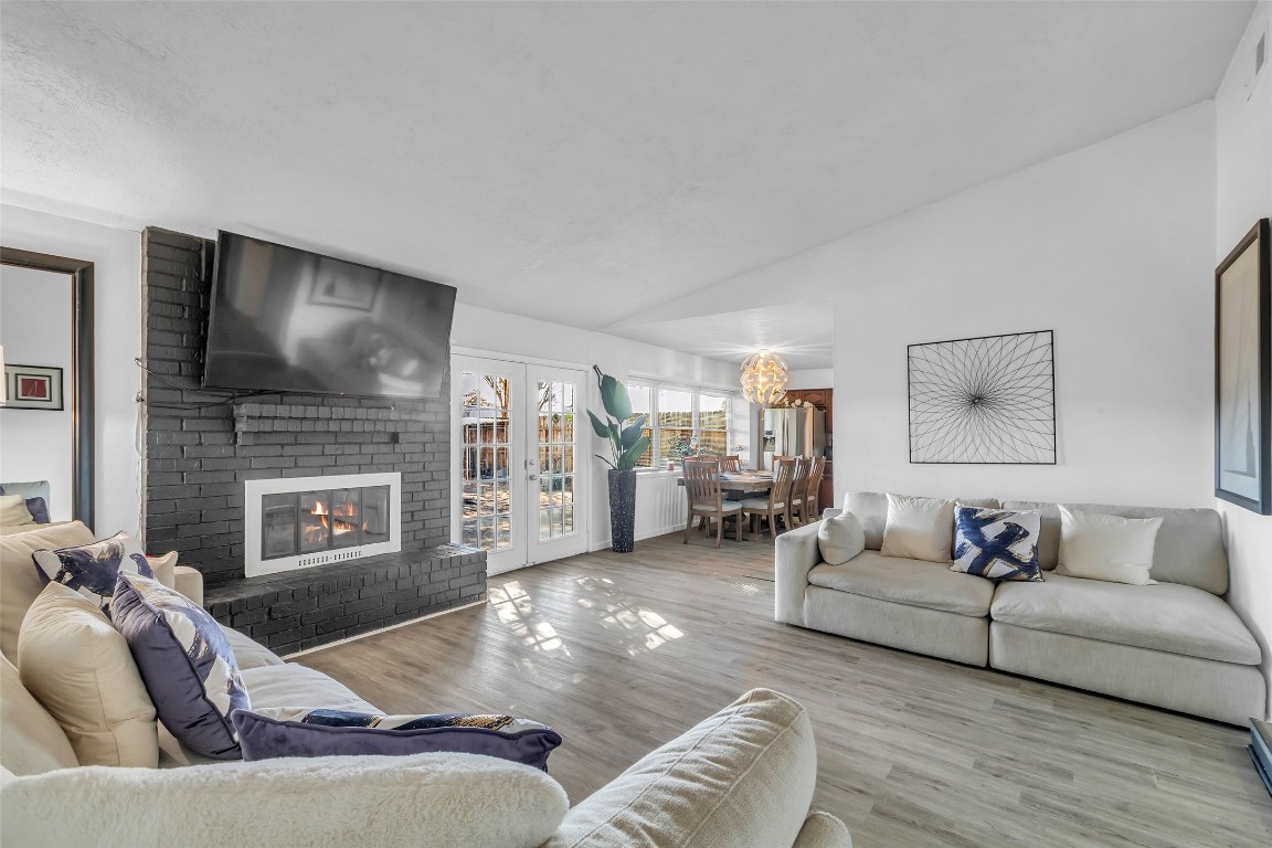 3435 Acorn Springs Lane Spring, TX 77389 - Photo 9 of 23 a living room with furniture fireplace and a flat screen tv