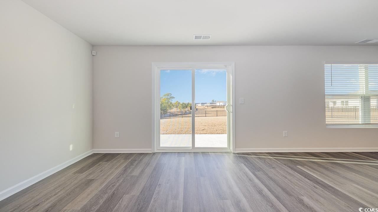 3433 Ashridge Way Conway, SC 29526 - Photo 11 of 31 Unfurnished room featuring hardwood / wood-style f