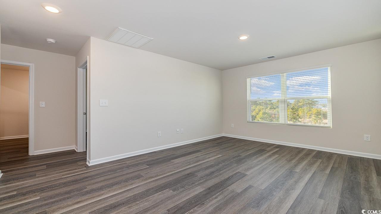 3433 Ashridge Way Conway, SC 29526 - Photo 16 of 31 Spare room featuring dark hardwood / wood-style fl