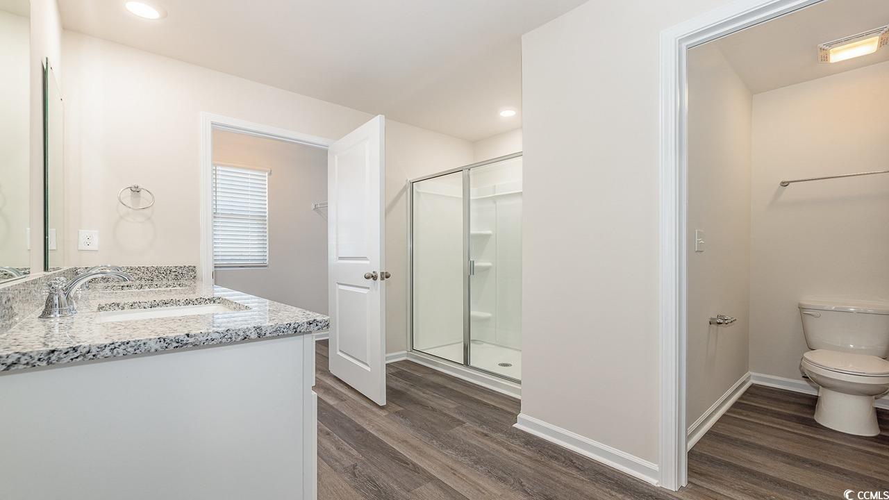 3433 Ashridge Way Conway, SC 29526 - Photo 20 of 31 Bathroom featuring walk in shower, wood-type floor