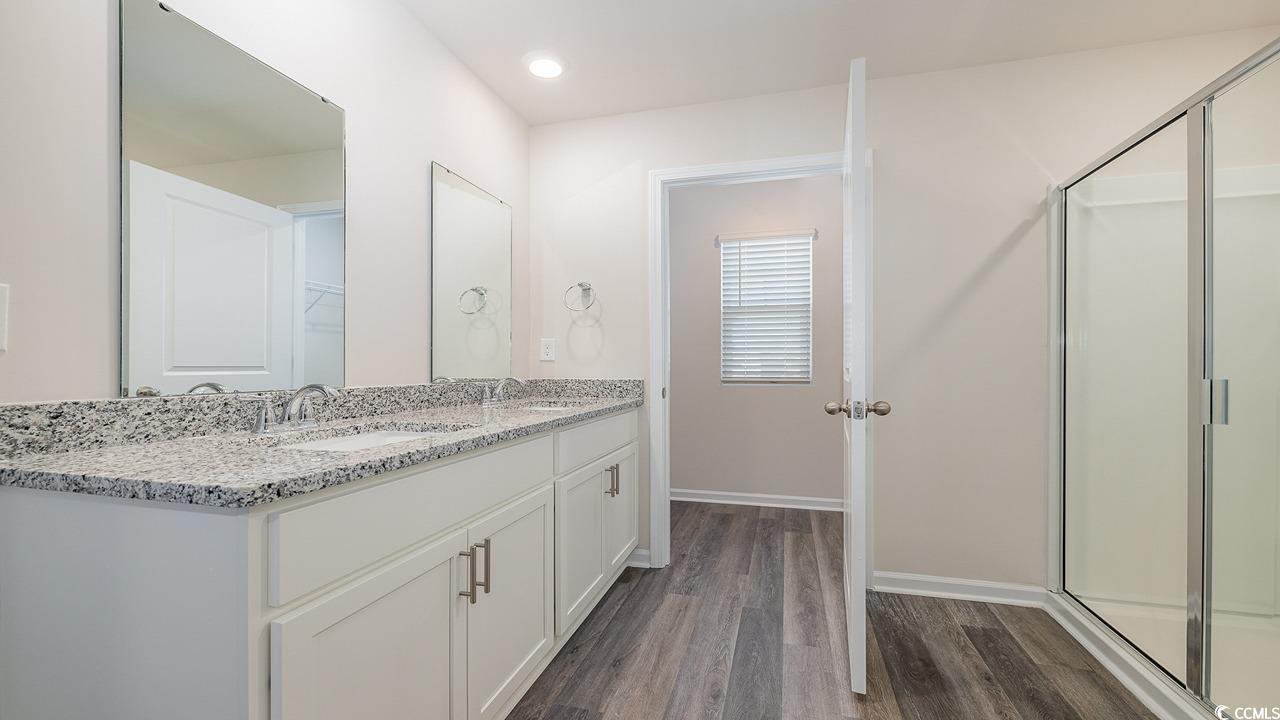 3433 Ashridge Way Conway, SC 29526 - Photo 21 of 31 Bathroom with hardwood / wood-style flooring, vani