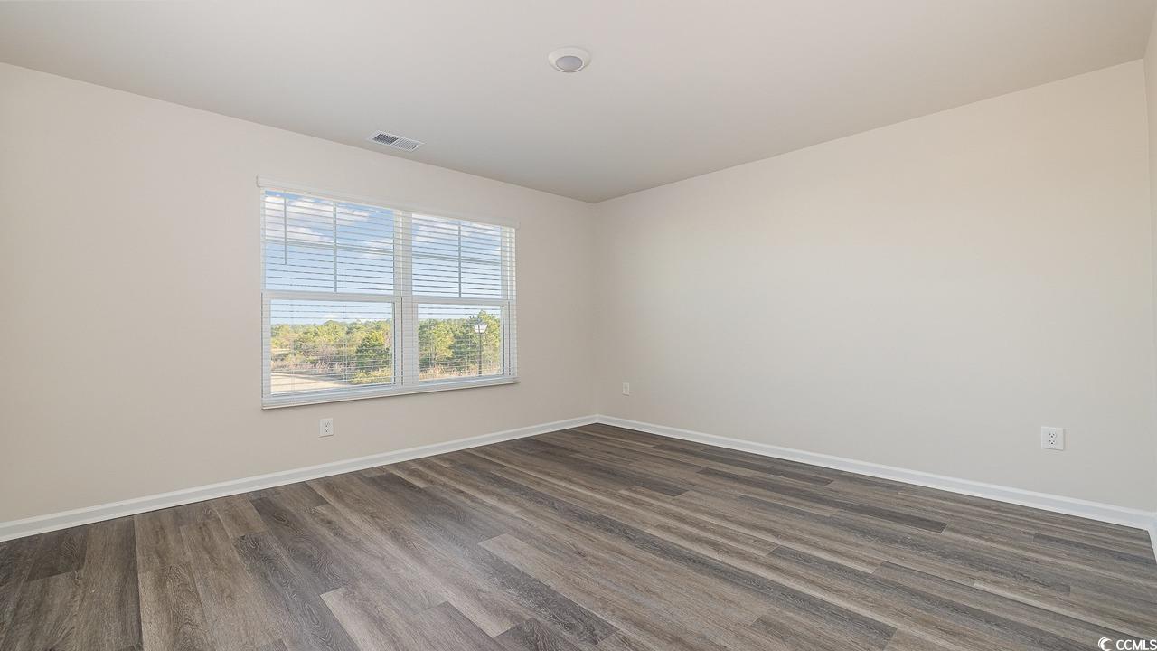 3433 Ashridge Way Conway, SC 29526 - Photo 29 of 31 Empty room featuring dark hardwood / wood-style fl