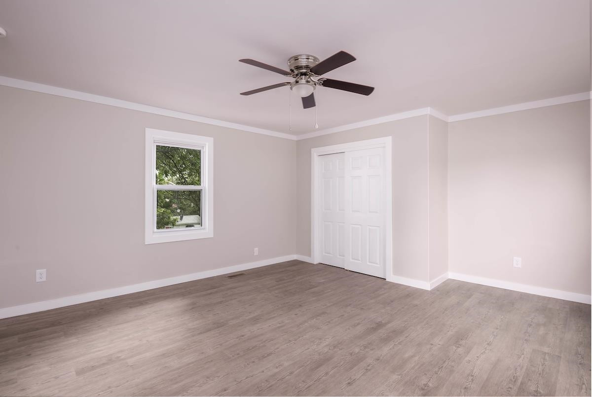 314 Depot Street Roxboro, NC 27573 - Photo 25 of 35 a view of an empty room with a window