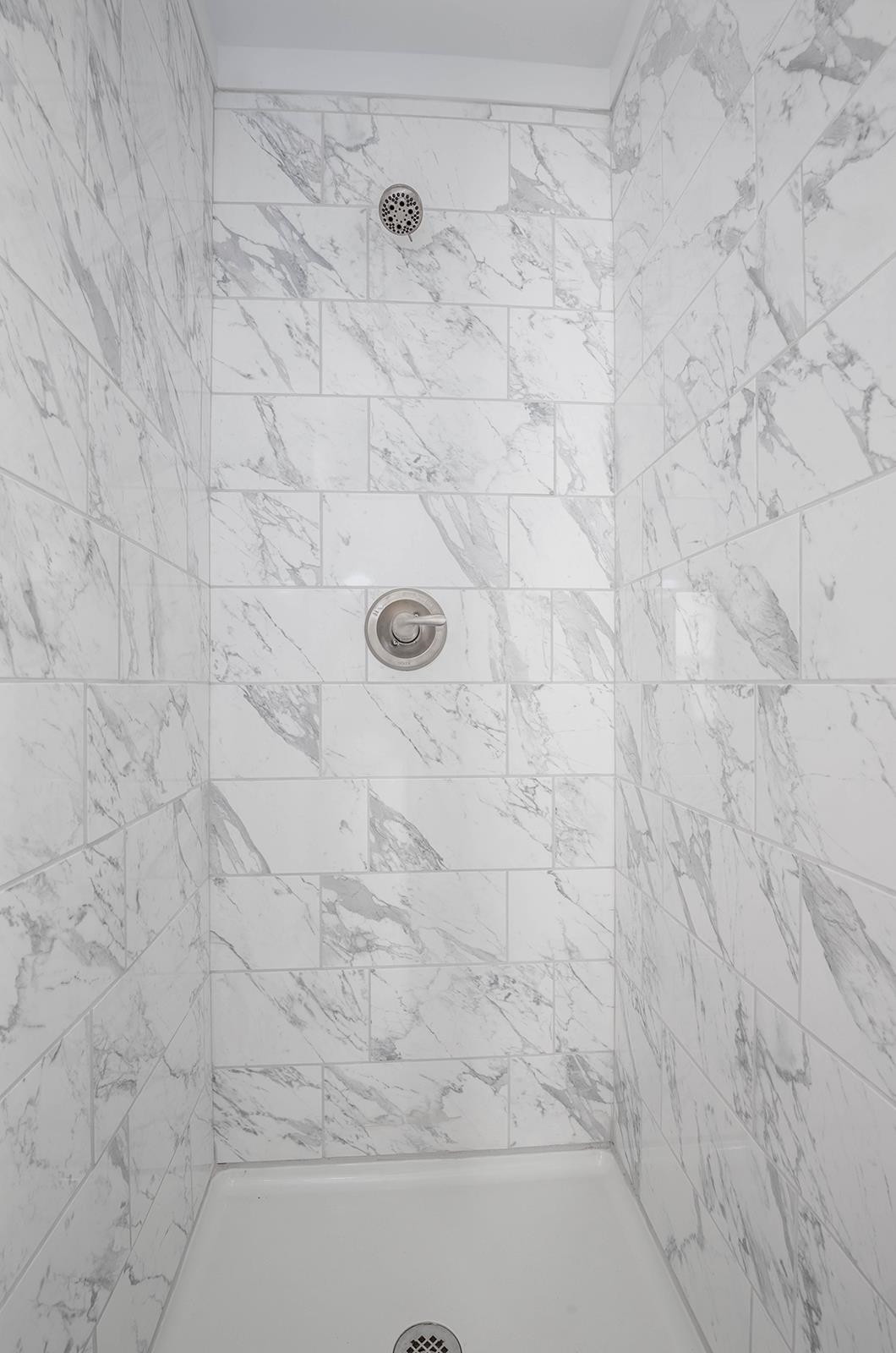 314 Depot Street Roxboro, NC 27573 - Photo 32 of 35 a bathroom with a shower
