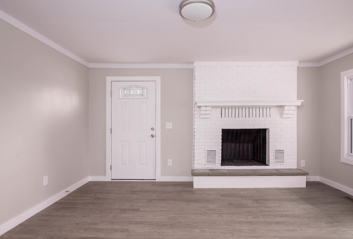 314 Depot Street Roxboro, NC 27573 - Photo 7 of 35 a view of a livingroom with a fireplace