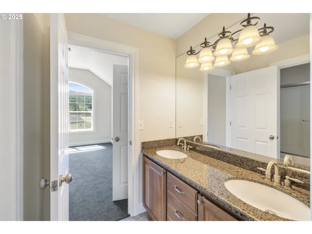 a view of a swimming pool with a yard