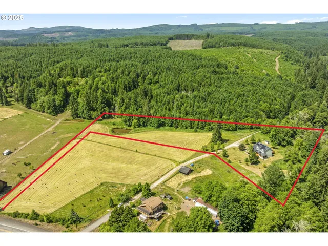 a view of swimming pool with deck and a yard