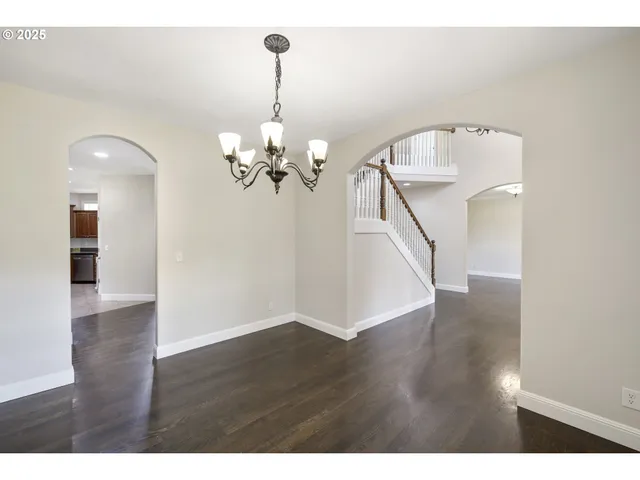 a view of a livingroom with wooden floor
