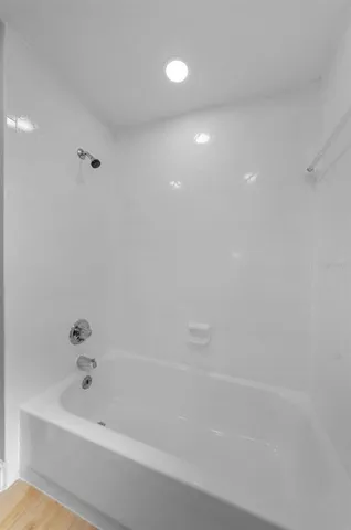 a bathroom with a bathtub