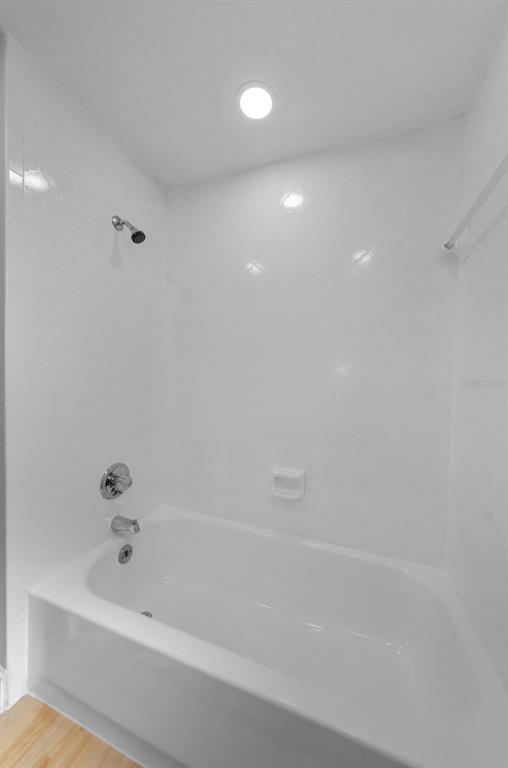 12920 Walnut Tree Lane Hudson, FL 34669 - Photo 29 of 35 a bathroom with a bathtub