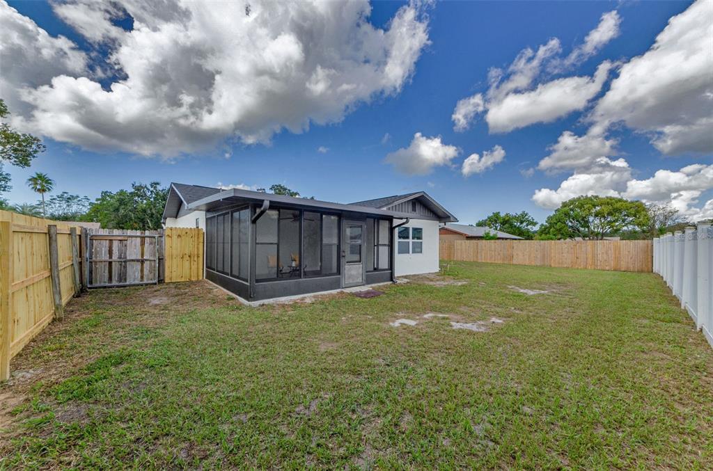 12920 Walnut Tree Lane Hudson, FL 34669 - Photo 33 of 35 a view of a backyard