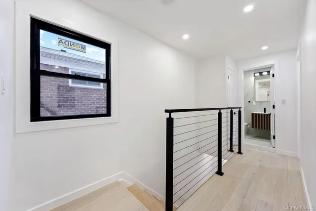 a view of entryway with stairs and a window